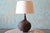 A 1960s ceramic lamp designed by Lee Rosen for Design Technics. A gourd form with Rosen’s signature textured finish, in an...