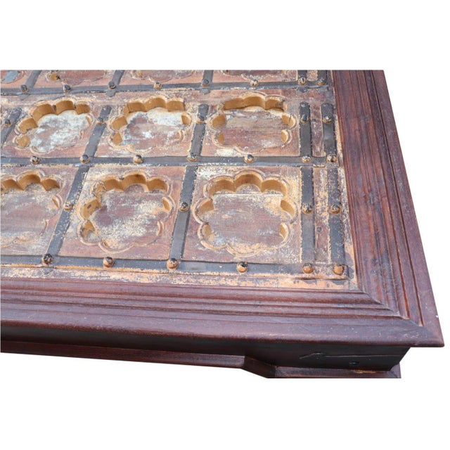 Dimensions: 76" W x 47.5" D x 31.5" H Late 1800's door with maple flower carved indentations has been repurposed to craft...