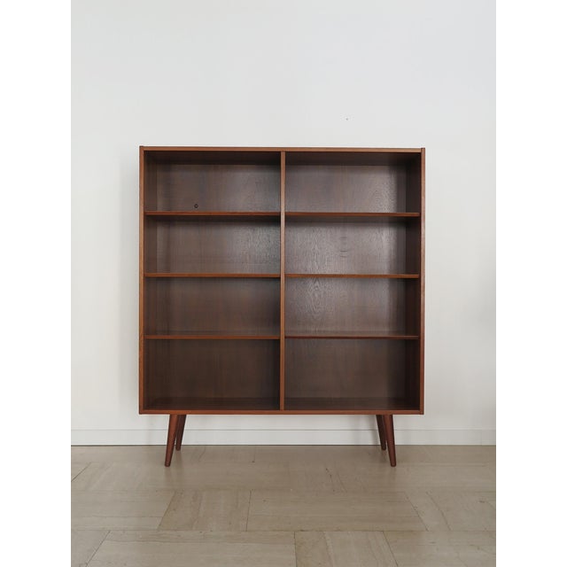 Scandinavian midcentury modern design dark wood bookcase designed by Gunni Omann and produced by Omann Jun Møbelfabrik in...