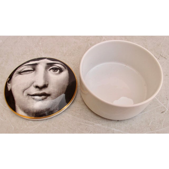 Porcelain Fornasetti covered box by Rosenthal Tema E Variazoni. Made in Germany circa 70s. Black and white design with a...