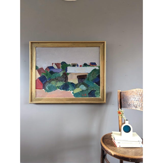 HILLSIDE HOUSES Size: 26.2 x 32.3 inches (including frame) Oil on Canvas A mid-century modernist painting presents a...