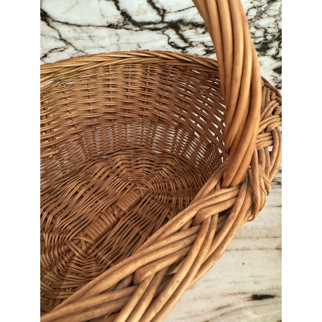 Gorgeous French antique market find, handmade wicker harvest handled basket. Made in Provence, France.