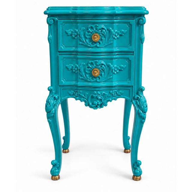 A captivating fusion of French Provincial elegance and contemporary maximalist design, this exquisite two-drawer accent...