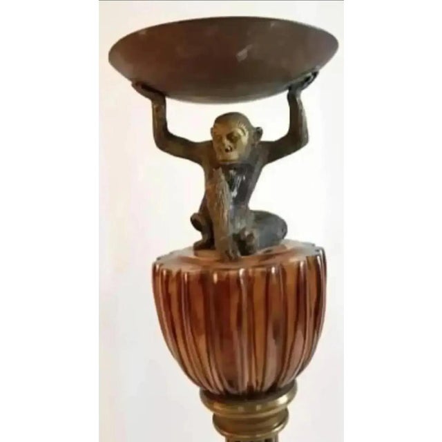 For your consideration: A rare and fabulous ornate pair of tall candle torchières. Each candle torchière is made of heavy...