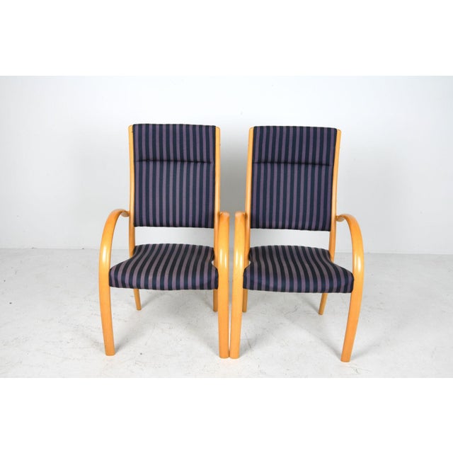 Beautiful pair of Finnish lounge chairs with bentwood beech frames and striped silk upholstery. These are (c), 1970s and...