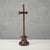 This antique solid wood altar cross, dating back to the 19th century, is a fine example of period devotional...