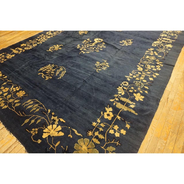 Room Size Antique Knotted Blue Chinese Wool Rectangle - Peking 1920s Rug, Circa Date: 1920s. This exceptional example of...