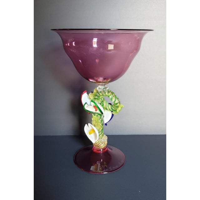 Gorgeous and unique Murano blown glass tazza compote footed by Maestro Davide Fuin. This large amethyst glass piece...