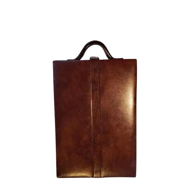A vintage 1980s Pottery Barn Cribbage Board. More than a game, this piece is a leather-bound folio designed for the...