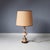 This table lamp is made of onyx, brass-colored elements and wood. Modern design from the 1960s. Original vintage shade....