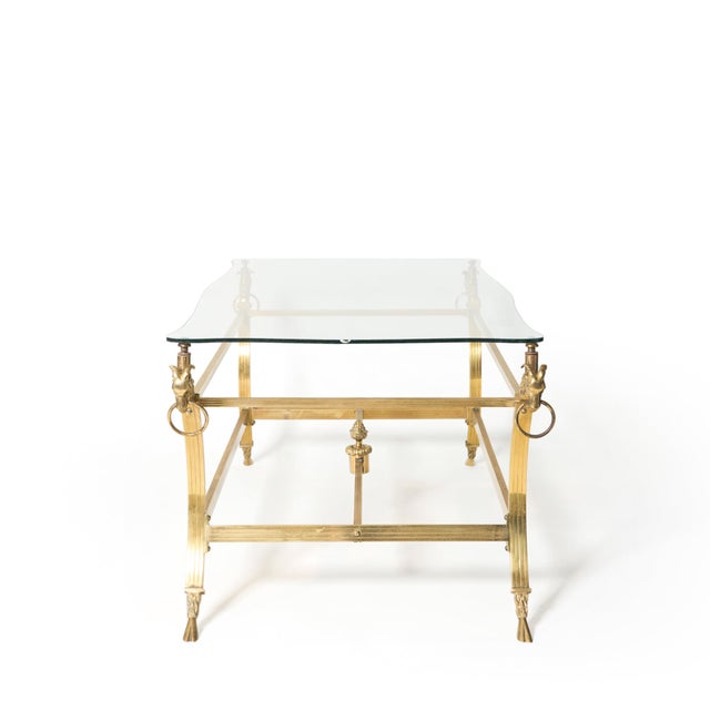 This table was found in the south of France. Brass structure with ram head details and cloven hoof legs, this is a truly...