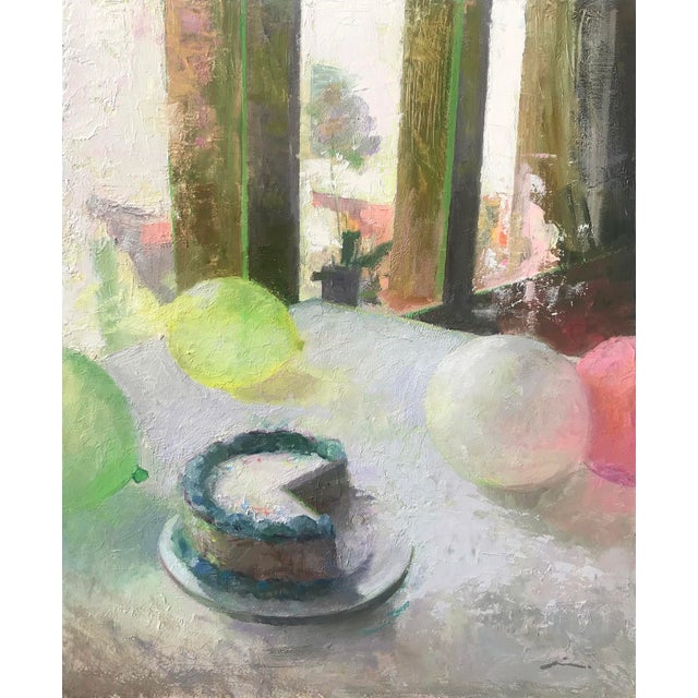 This oil on panel artwork captures a serene still life, featuring a slice of cake on a plate amidst colorful balloons. The...