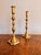 Quality pair of large antique Victorian brass candlesticks, having a quality pair of brass candlesticks with circular...