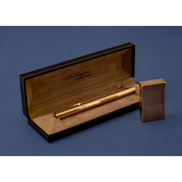 This exclusive s.t. Dupont set brings together two refined examples of french craftsmanship, combining vintage character...