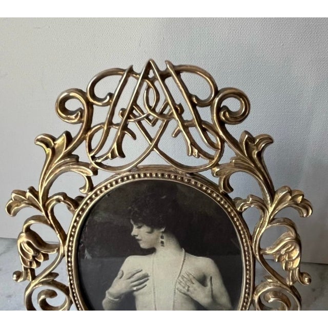 Metal Ornate Vintage Victorian-Style Brass Oval Picture Frame With an Intricate Scrollwork Design and a Standing Easel Base. For Sale - Image 7 of 8