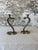 An eye-catching pair of vintage solid brass cobra candlestick holders featuring sculptural rearing snakes with coiled...
