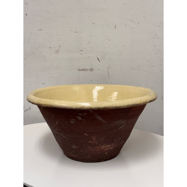 Design Plus Gallery presents a Late 19th Century Antique French Dairy Bowl. This substantial dairy bowl dates to the late...