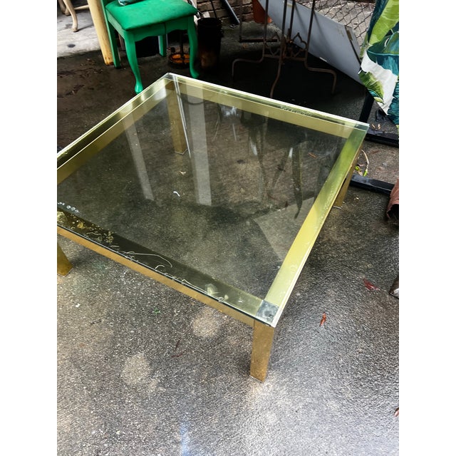 Up for consideration is a beautiful vintage gold square coffee table with a glass top. This would look lovely in your home...
