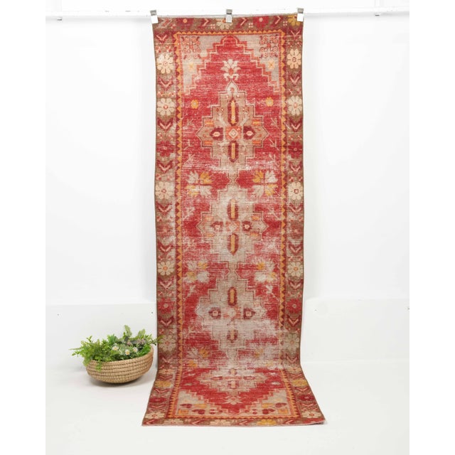 Vintage Turkish Hand-Knotted Runner rug is a semi-antique vintage runner rug. The '70s Eastern region of Anatolian's...