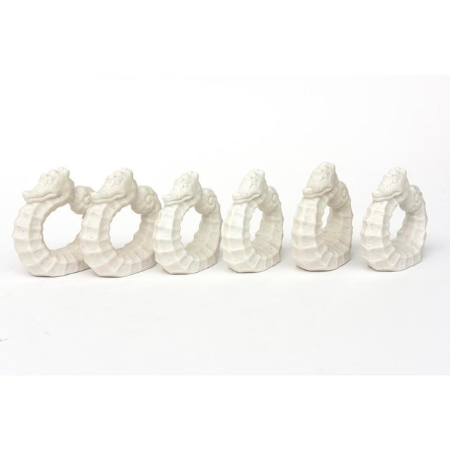 This fabulous never used vintage coastal 1950's porcelain napkin rings are in the shape of a seahorse. They have texture...