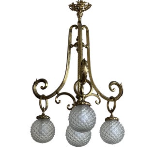 Early 20th Century Brass Chandelier With Glass Globes For Sale