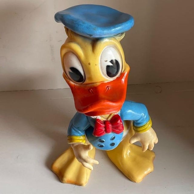 Set of four vintage rubber figures depicting Mickey Mouse and Donald Duck, produced by the historic Biserka factory in...