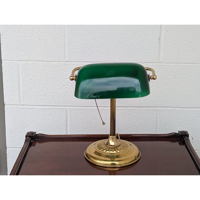 Illuminate your workspace with this Vintage Green Banker’s Lamp, a quintessential piece of Mid-Century library decor...