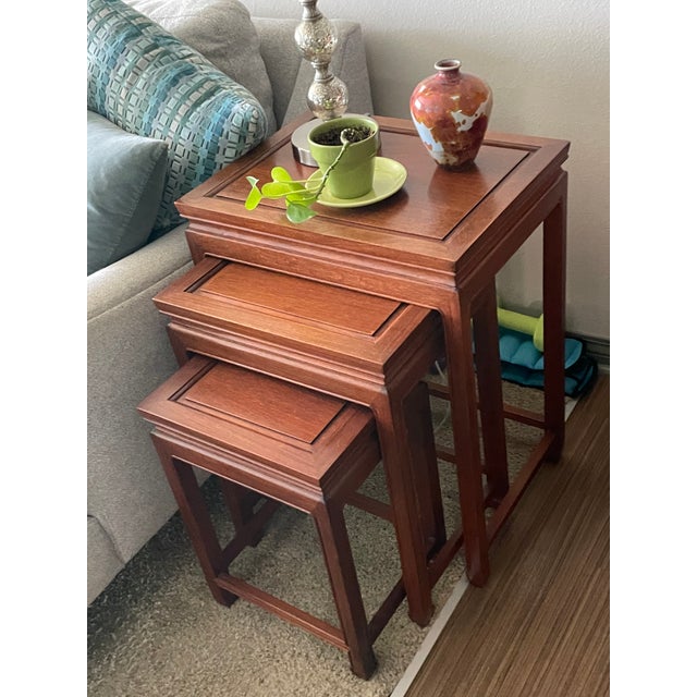 Two sets of three Ming style rosewood nesting tables. Purchased by my parents in Hong Kong in 1962 and imported by them....