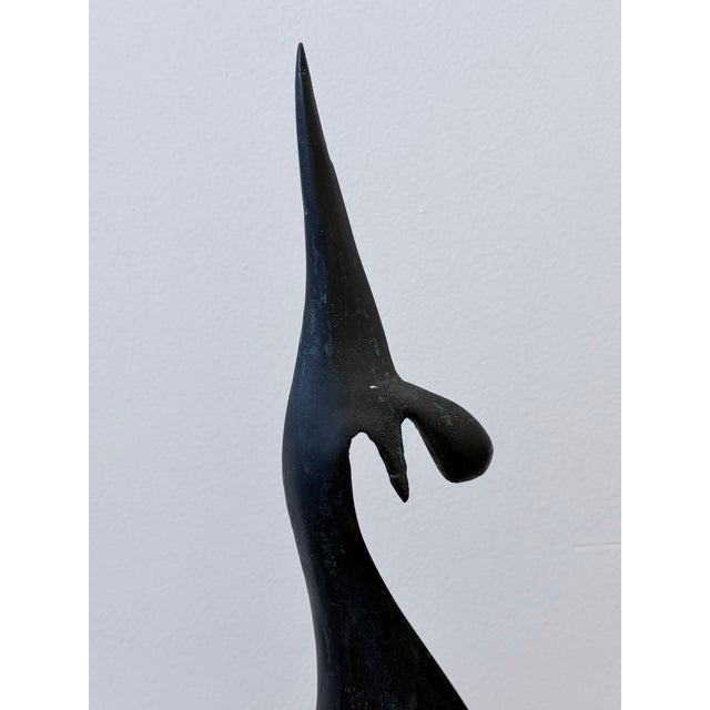 Mid-Century modern abstract bronze sculpture on granite base by unknown artist. Brazil 1960s.