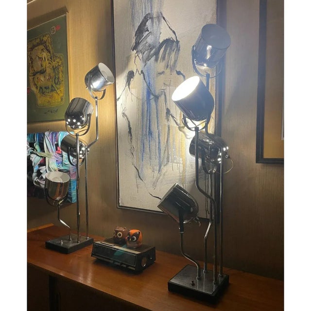 Stunning pair of Post-Modern chrome spotlight lamps by Goffredo Reggiani. These Italian made lamps each feature four...
