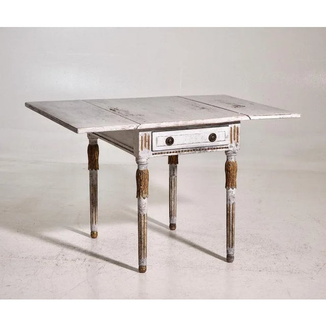 Original painted danish drop-leaf table, circa 1790h. 77 w-open. 121 w-closed. 63 d. 84 cm h. 30.3 w-open. 47.6 w-closed....