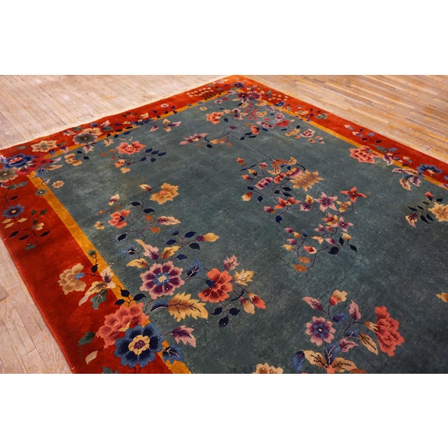 Tranquil and Calming Light Blue Background With Warm Red Field and Magnificent Array of Multicolored Floral Motifs Antique Chinese Art Deco Rug For Sale - Image 12 of 15