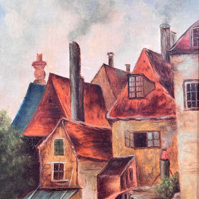 Antique European Canal Village Oil Painting in Ornate Gilt Frame A charming European waterfront village scene with steep...