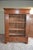 18th-century German oak wooden spinning cabinet. Height: 195 cm. Width: 146 cm. Depth: 67 cm. Shelves behind the door....