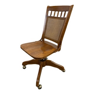 Vintage Mid-Century Modern Cane Back Rolling Swivel Bankers Chair For Sale
