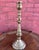 This is an elegant vintage brass 14.25 in candlestick by The Bombay Company, featuring a tall turned baluster-form stem...