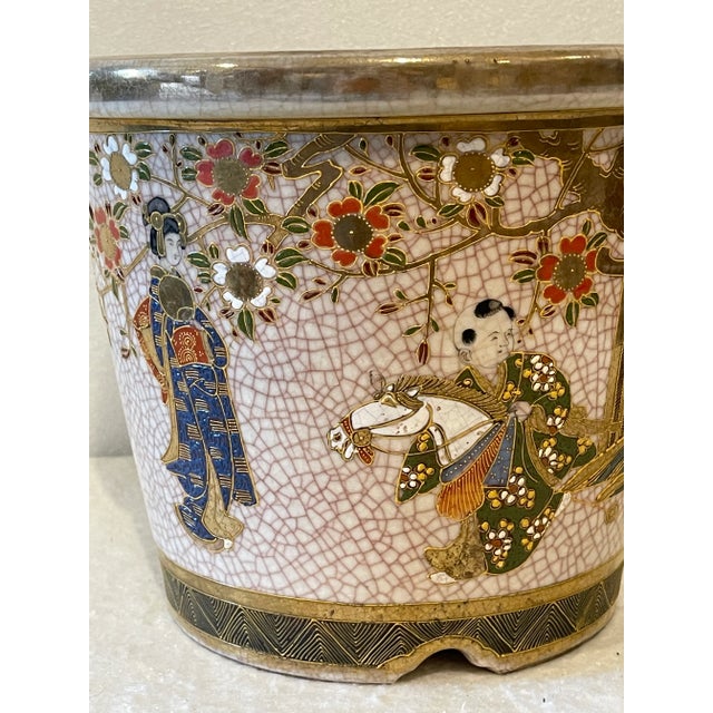 Antique Japanese satsuma Moriage decorated ceramic planter with horse and oriental figures. Gold gilt and crazed decoration