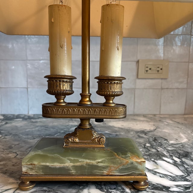 The base measures 7.5x4.” It is 19.75” tall to the top of the finial. It is 12x8” at its widest point (the shade). 16.25”...