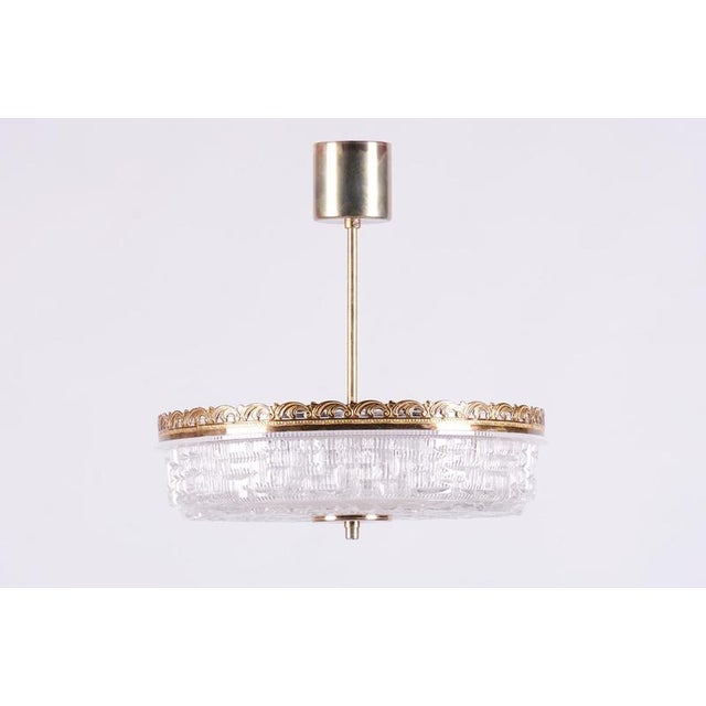Maker: Kamenický Šenov This elegant chandelier comes from the production of the famous Czechoslovak lighting manufacturer...
