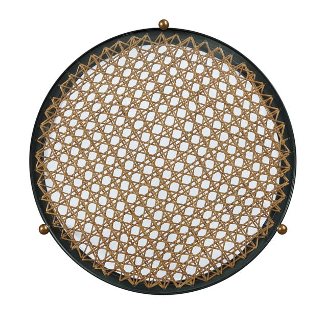 This piece is available only as shown, and will ship in 2-3 weeks. Airy wrought iron and woven cane create the mixed...