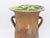 This Italian top hat-style stoneware pichet urn from the early 20th century features an elegant design with two sturdy...