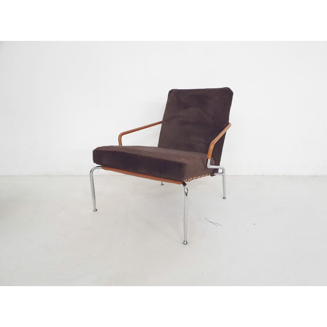 Lounge chair with ottoman designed by Rodolfo Dordoni for Minotti. The ottoman is labeled by the manufactureer. We also...