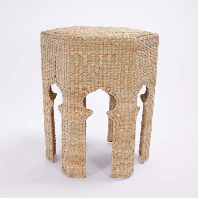 Standout Moroccan style table or stand handcrafted with a metal frame and expertly covered in woven reed in a hexagon form...