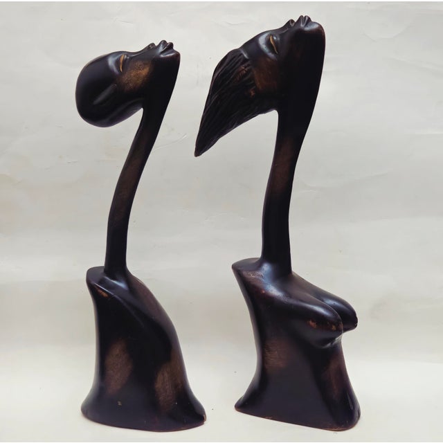 Mid century African sculpture wood art with highly stylized, minimalist heads Wonderfully carved with elongated necks...