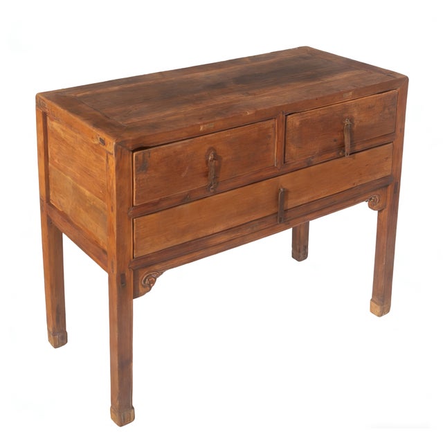 This mid-19th century versatile side table made from walnut wood features a classic three-drawer configuration, with two...