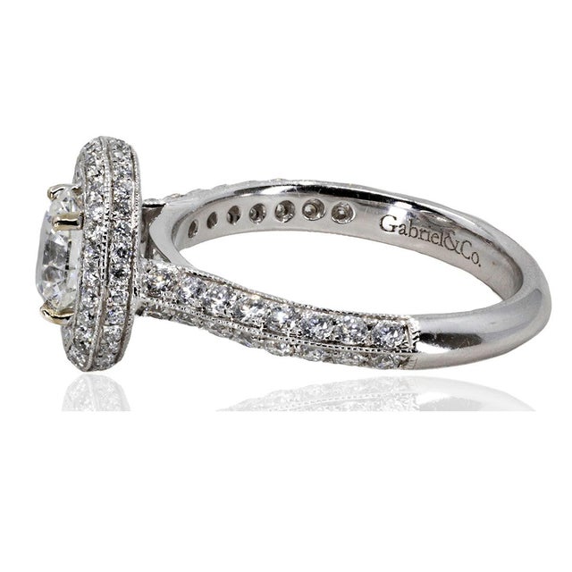 14k White gold ring with one GIA certified (#2231091292) F color I1 clarity, 1.01 carat round brilliant and 0.89 carats of...