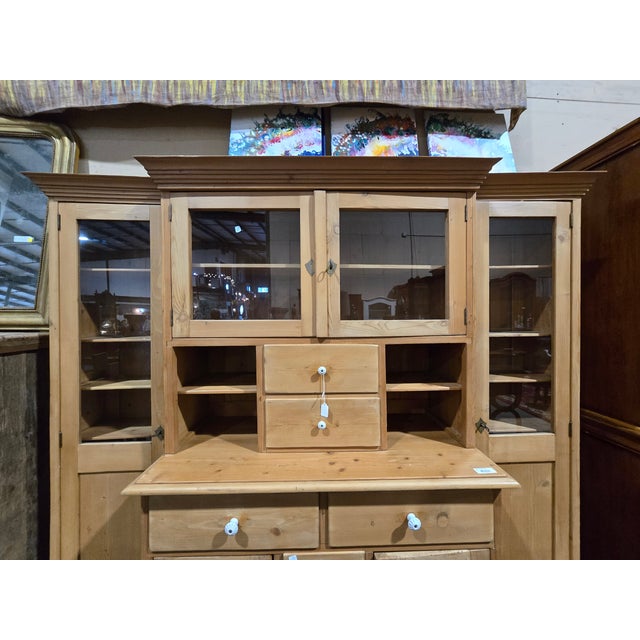 A beautifully preserved late 19th century Alpine farmhouse cupboard, crafted in solid pine circa 1880–1900. Likely...