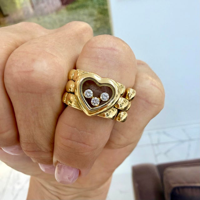 Brand: Chopard Gender: Ladies Metal Type: 18K Yellow Gold Ring Size: 6 Width: 10.40 mm Weight: 16.29 grams Ladies CHOPARD...