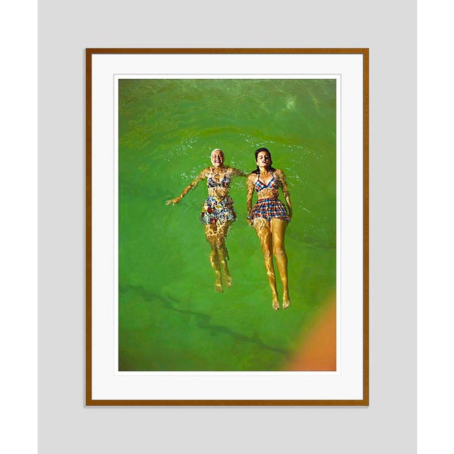 1961 Two women in swimwear float on water 1961. Toni Frissell Antoinette Frissell Bacon (March 10, 1907 – April 17, 1988),...