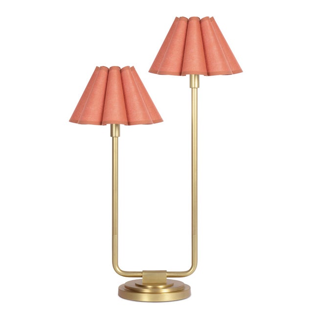 An imaginative twist on a classic style, the Polly Double Arm Table Lamp reaches upward with twin scalloped shades that...